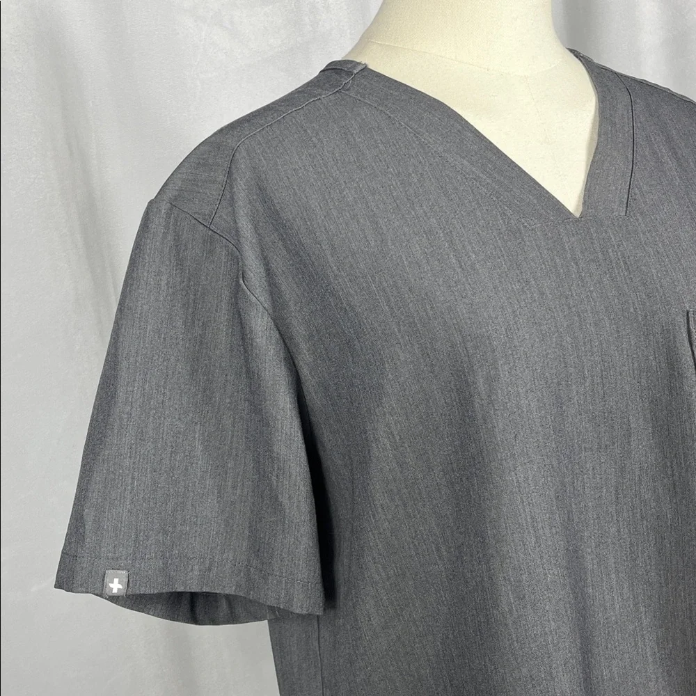 Men’s Chisec‎ Three-Pocket Scrub Top in Graphite Gray.